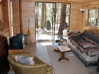 inside the additional room off of the side of the popular Madrona cabin kit made by bavariancottages.com